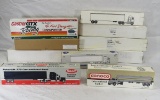 Diecast truck and trailers in boxes