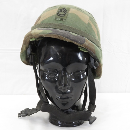 Army helmet with liner on glass head
