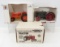 3 ERTL tractors in boxes