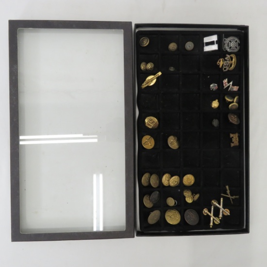 Military buttons, insignia and more in riker