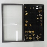 Military buttons, insignia and more in riker