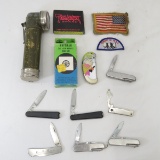 Pocket knives, military flashlight, lighter