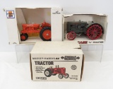 3 ERTL tractors in boxes