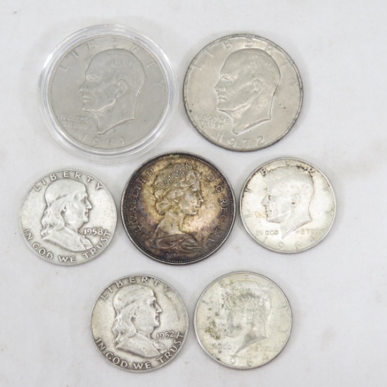 $2 face silver, 1 Canadian Sliver & 2 Ike Dollars