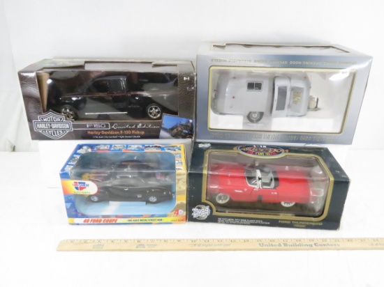 4 Diecast 1:18 scale Car Models in Boxes