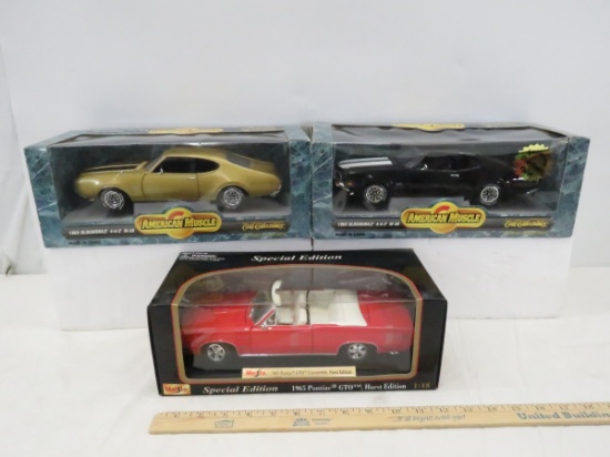 3 Diecast Car Models in Boxes