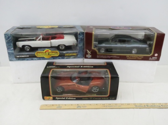 3 Diecast 1:18 scale Car Models in Boxes