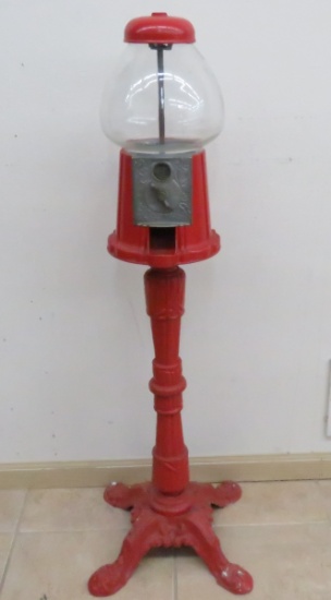 Vintage metal and glass gumball machine