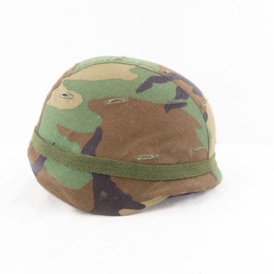 US Military helmet with camouflage cover