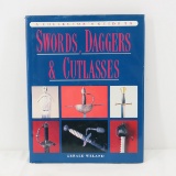 Guide to Swords, Daggers, & Cutlasses book