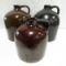1 gallon & 2 2 gallon Albany Slip Stoneware Jugs