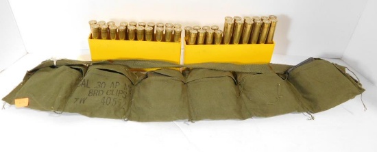 Lot #60J - Full bandoleer of Cal .30 M2 eight round clips, 9.3 x 74R spent brasses and (7)  rounds