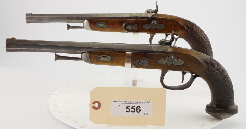 Lot #556 - Pair Canon & Foron Percussion Pistols