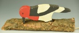 Lot 3432 - Primitive redheaded woodpecker door knocker on log base 10”