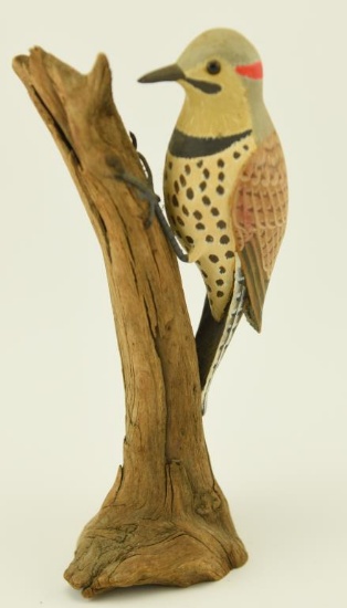 Lot 1113 - Carved Northern Flicker on driftwood by C. Kemper 9”H