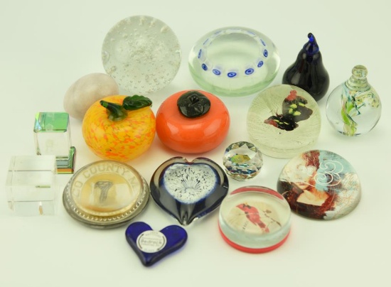 Lot 1120 - Approximately (16) art glass paper weights in various shapes and sizes several are
