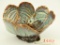 Lot 1482 - Art pottery bowl in the form of leaves with applied butterflies to the interior