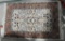 Lot 1596 - Small oriental style wool pile area rug with fringed ends (39” x 24 ½”)