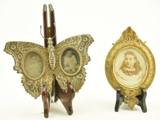 Lot 1432 - (2) bronze picture frames containing early photos: one in the form of a butterfly