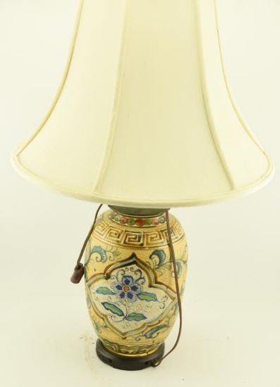 Lot 1548 - Painted porcelain lamp on oriental carved wood base (30 ½”in height)