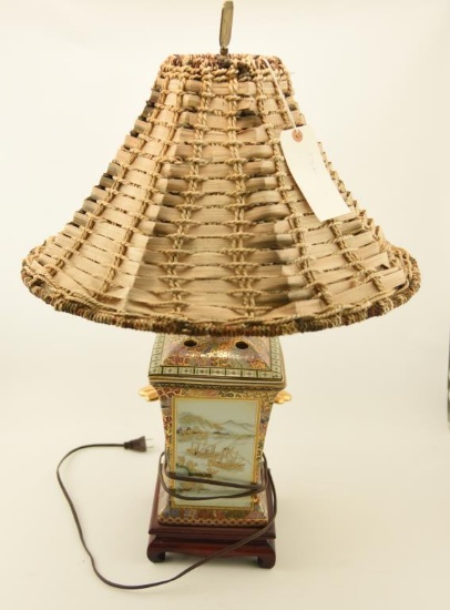Lot 1557 - Oriental Satsuma style old  painted porcelain lamp with wicker shade (27 ½” in height)