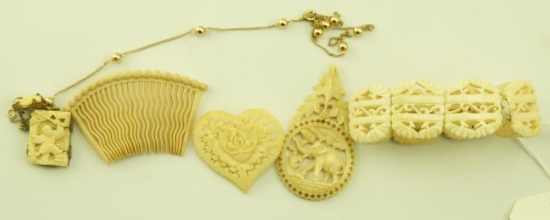 Lot 1628 - Jewelry lot of (6) pieces: 4 carved pieces, an early plastic hair piece, and a gold