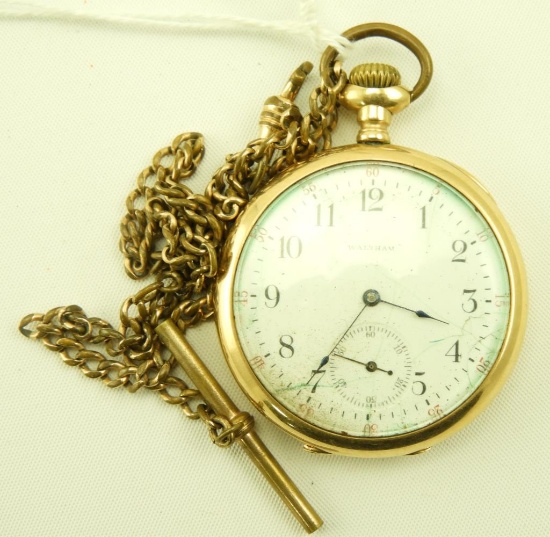 Lot 1631 - 14k gold cased Waltham pocket watch with open face and gold filled chain: watch by