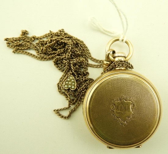 Lot 1632 - A.W. & Co Waltham 14k gold cased pocket watch on gold filled Victorian slide chain: