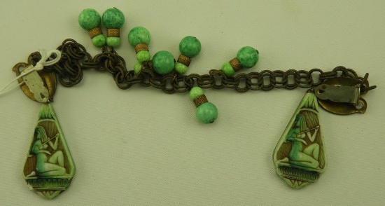 Lot 1643 - Art Deco Egyptian Revival style glass fur clip