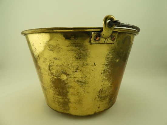Lot 1650 - Antique brass bucket with iron swing handle