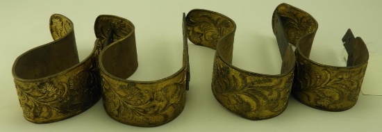 Lot 1651 - (4) Bronze curtain tiebacks with floral decoration