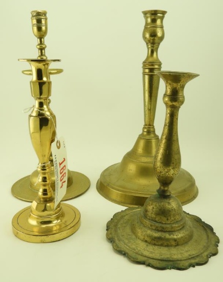 Lot 1664 - (4) Brass candlesticks, Dutch and Spanish