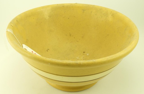 Lot 1665 - Large banded yellow ware family mixing bowl from Chicopee Falls, Massachusetts