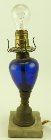 Lot 1685 - Unusual  early fluid lamp with cobalt font and marble base: converted to electricity