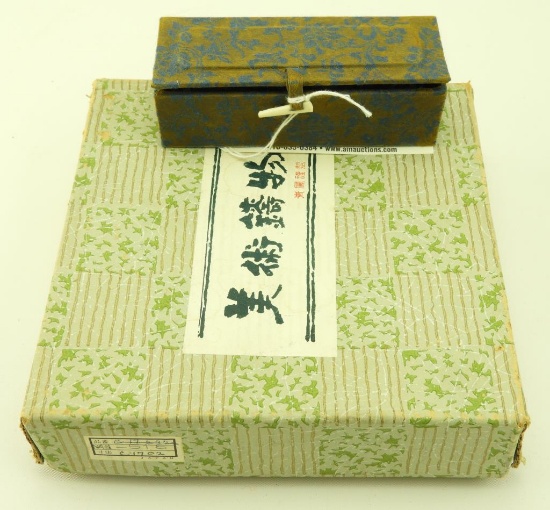 Lot 1714 - Chinese carved scroll weight along with iron censor: both in original boxes