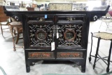 Lot 1604 - Oriental carved & lacquered cabinet (36 ½” in height, 49 1/4” in width, 15 ¾” in length)
