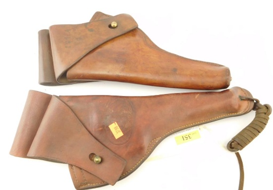2 Leather holsters to include: One is US issued and is marked US Milwaukee Saddlery Co. and  the