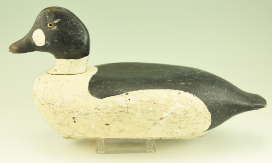 Lot #32 - Carved Goldeneye Hen signed Clint Rinus and branded CR (chip of wood missing to under