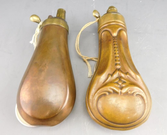 Lot #233 - (2) Small Civil War era brass powder flasks (1) plain, (1) paneled (approx 4”  each)