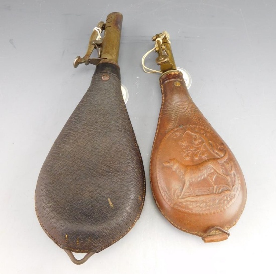 Lot #250 - (2) Vintage leather shot pouches (1) Bird dog motif, (1) tanned black leather