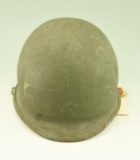 Lot #128 - US M1 WWII era Type 1 helmet with interior liner