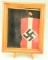 Lot #227 - Small Framed German WWII Swastika uniform armband