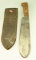 Lot #390 - USMC Bolo knife by Chatillon, NY with US marked 1942 scabbard by Boyt. Some rust and