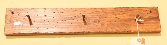 Lot #164 - Primitive style 20” Pine hanging game board with (3) old style cast iron nails