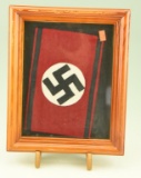 Lot #225 - Framed German WWII Swastika armband in 11” x 9” frame