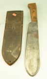 Lot #390 - USMC Bolo knife by Chatillon, NY with US marked 1942 scabbard by Boyt. Some rust and