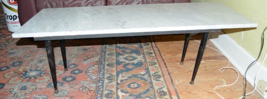 Lot #23 - Marble top cocktail table (48” x 18” x 15”)