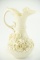 Lot #408 - Irish Belleek “Aberdeen” handled ewer with heavily applied floral decoration and