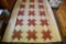 Lot #539 - Red and Ivory pattern antique handsewn quilt (94” x 96”)