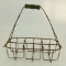 Lot #681 - Six Milk Bottle Wire carrying rack with Wood handle